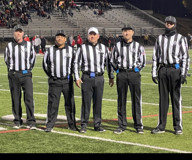Crew Berg football officials at the 2024 MSHSL State Tournament